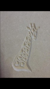 CNC routed sketch of a giraffe.